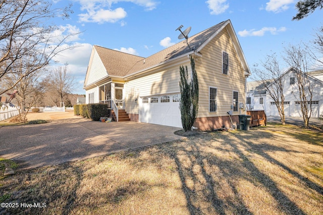 view of property exterior with a garage