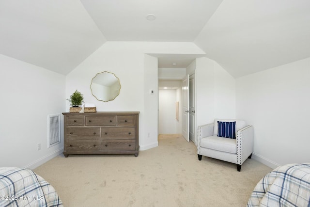 carpeted bedroom featuring lofted ceiling