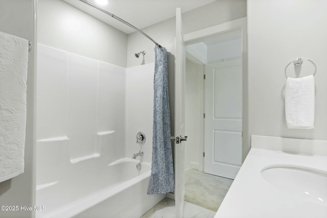 bathroom featuring sink and shower / tub combo