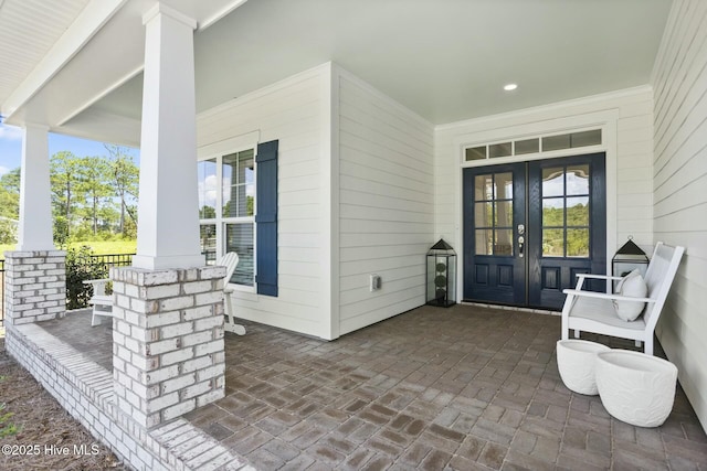 entrance to property with french doors and covered porch