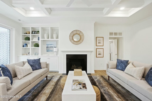 living room featuring coffered ceiling, dark hardwood / wood-style floors, ornamental molding, and beam ceiling