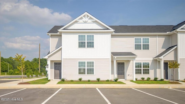 view of front of property featuring uncovered parking