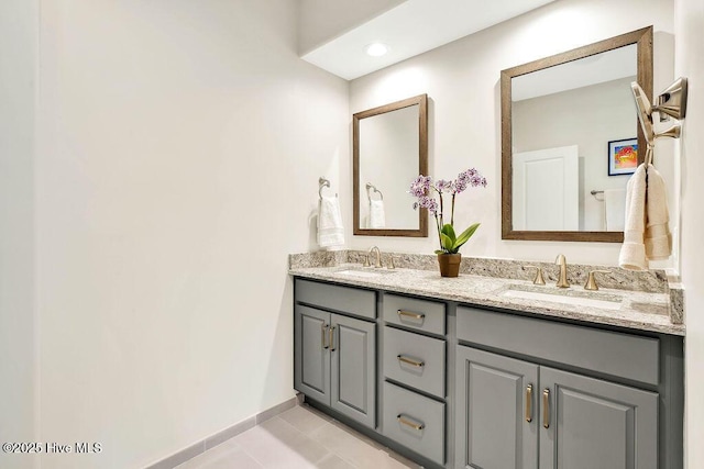 bathroom with vanity and tile patterned floors