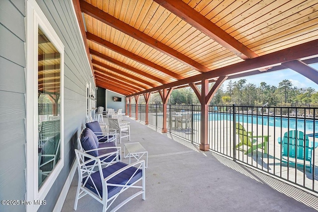 view of patio with a community pool