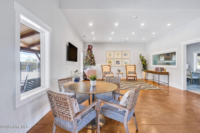 dining space with concrete flooring