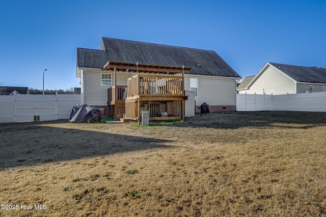 back of house featuring a yard