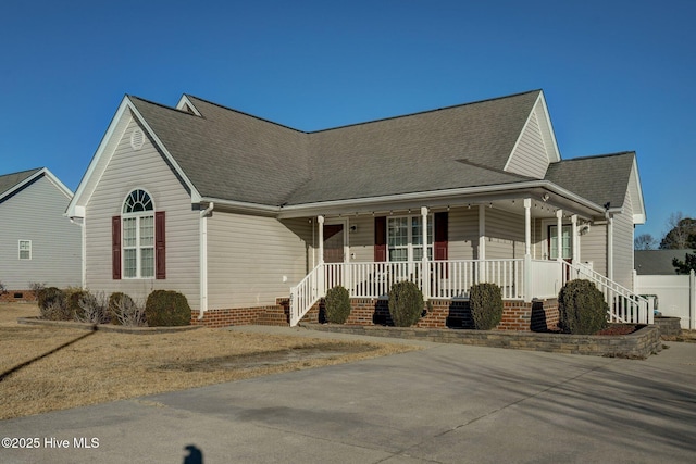 view of front of home featuring a porch and a front yard