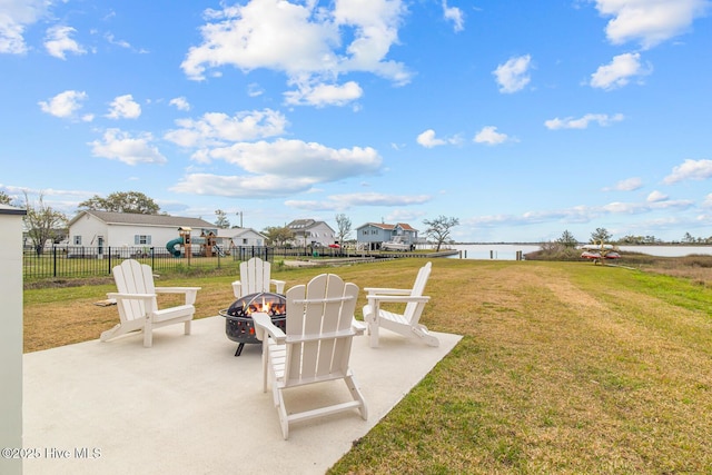 view of yard with a fire pit and a patio