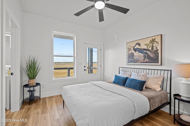 bedroom featuring hardwood / wood-style flooring and ceiling fan