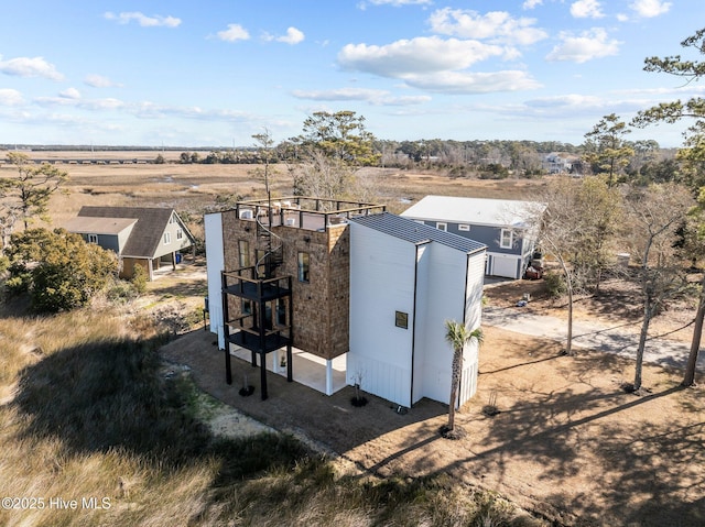 view of outbuilding featuring a rural view