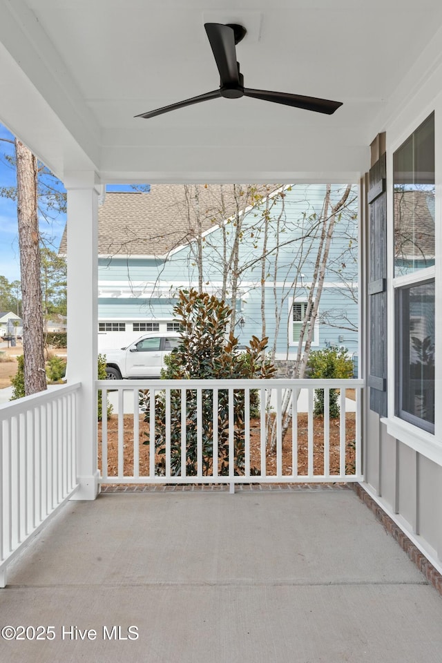 balcony with ceiling fan and a porch