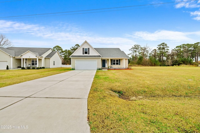 view of front of property with a front yard and a garage