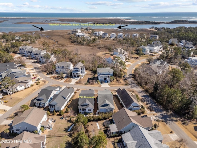 aerial view featuring a water view and a residential view