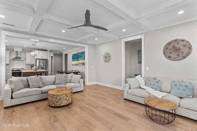 living room featuring light wood finished floors, beamed ceiling, coffered ceiling, and recessed lighting