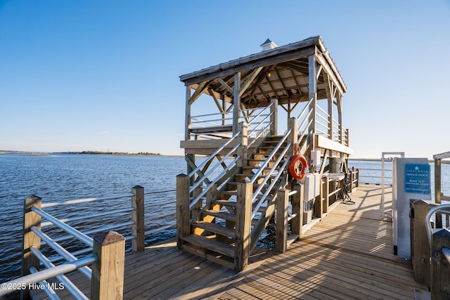 dock area with a water view