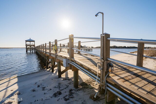 dock area featuring a water view