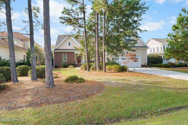 view of front facade with a front lawn and a garage