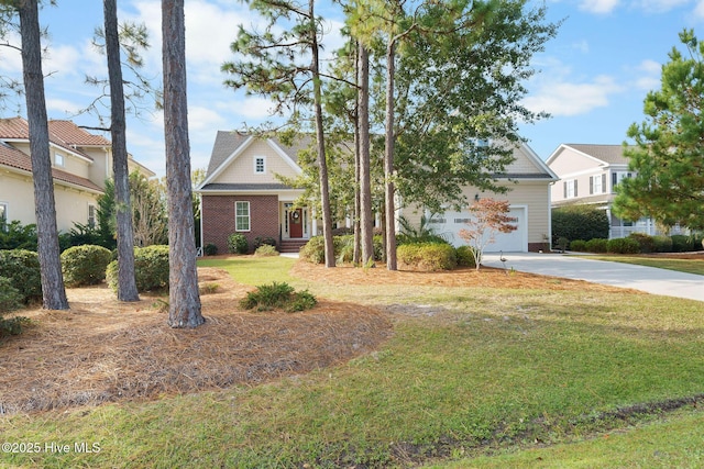 view of property hidden behind natural elements with a garage and a front yard