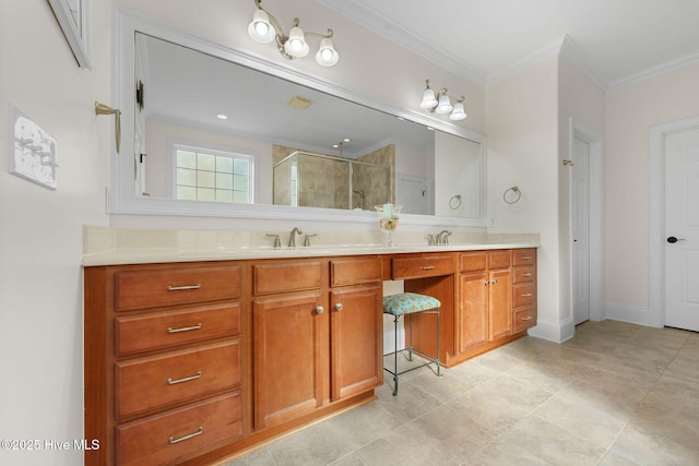 bathroom with an enclosed shower, vanity, and crown molding