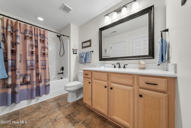 full bathroom with toilet, shower / tub combo, and vanity