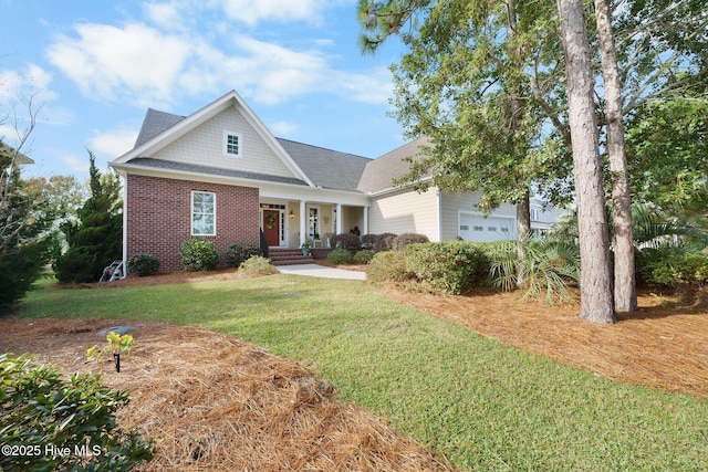 craftsman-style home featuring a garage and a front lawn