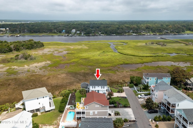 bird's eye view with a water view