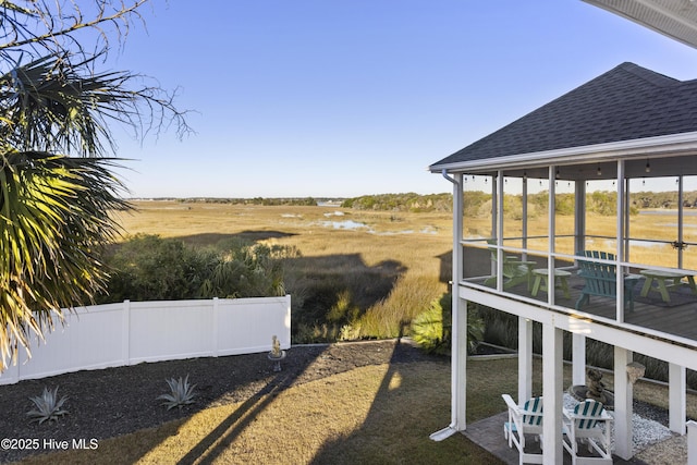 view of yard featuring a patio area and a rural view