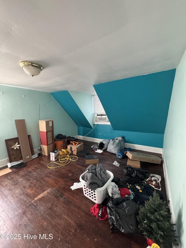 bonus room featuring hardwood / wood-style flooring and vaulted ceiling