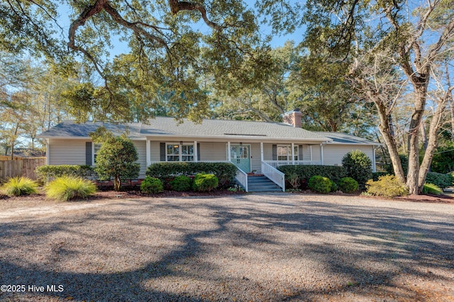 single story home featuring a porch