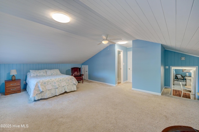 bedroom with light carpet, vaulted ceiling, and ceiling fan