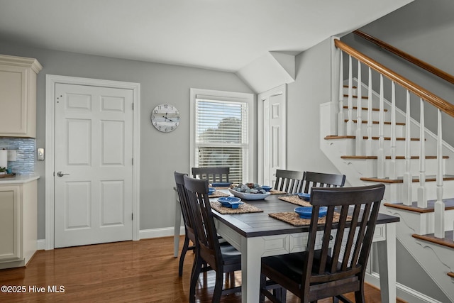 dining room with hardwood / wood-style flooring