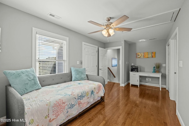 bedroom featuring ceiling fan and hardwood / wood-style floors