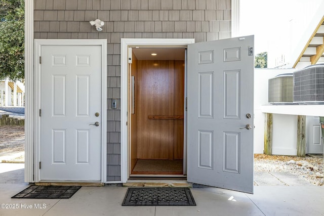 view of exterior entry featuring elevator