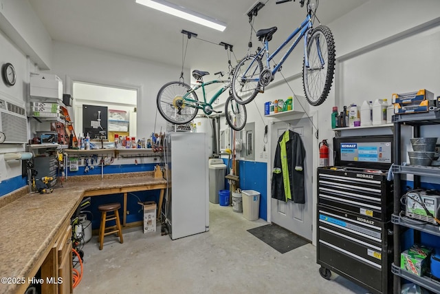 garage with a workshop area