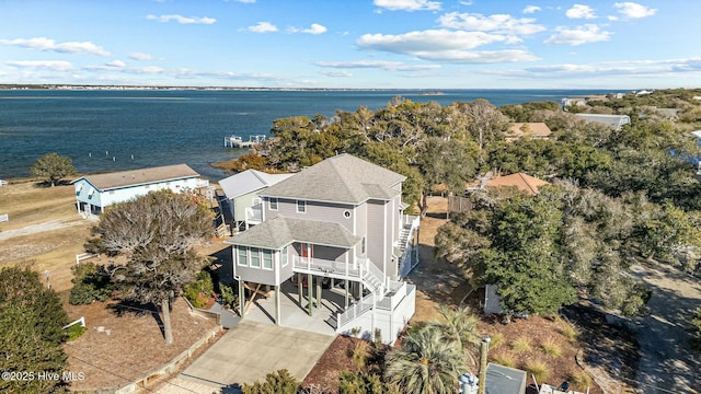 drone / aerial view with a water view