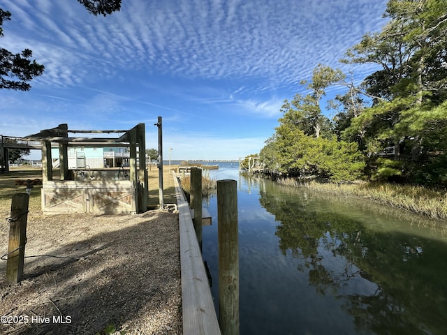 dock area featuring a water view