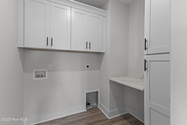 laundry area with washer hookup, cabinets, dark hardwood / wood-style floors, and hookup for an electric dryer