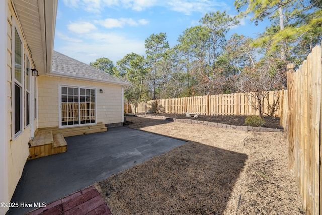 view of yard with a patio area