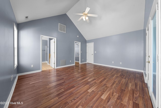 interior space featuring ceiling fan, dark hardwood / wood-style floors, and high vaulted ceiling