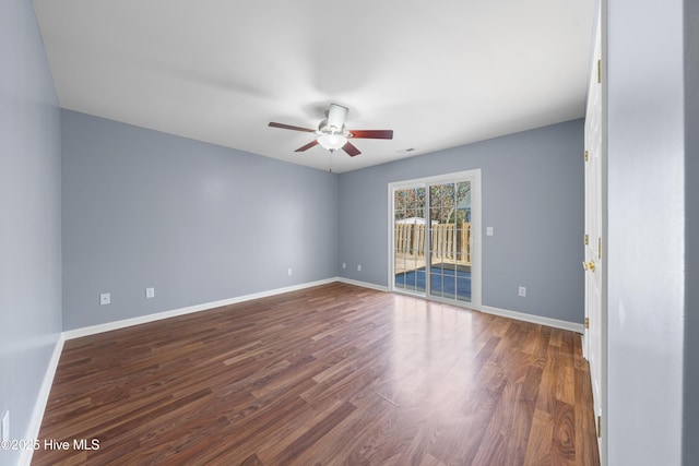 empty room featuring hardwood / wood-style flooring and ceiling fan