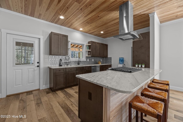 kitchen with wood ceiling, a breakfast bar, island exhaust hood, a kitchen island, and stainless steel dishwasher