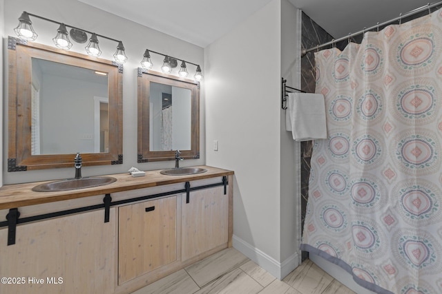 bathroom with vanity and a shower with shower curtain