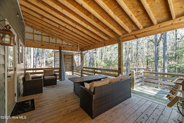 wooden deck featuring outdoor lounge area