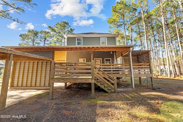 view of front facade with a wooden deck