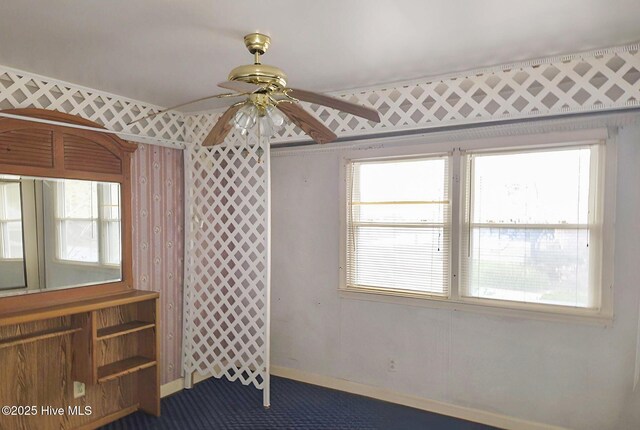 unfurnished living room with a textured ceiling, ornamental molding, a wood stove, and hardwood / wood-style flooring