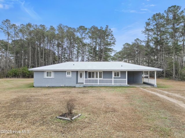 ranch-style house with a porch, a carport, and a front lawn