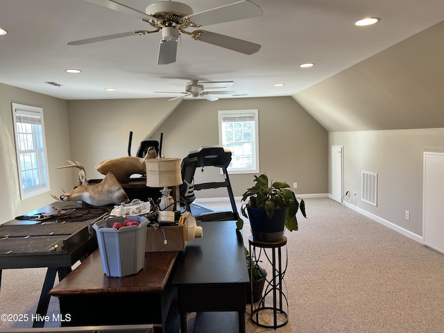 interior space with vaulted ceiling and ceiling fan