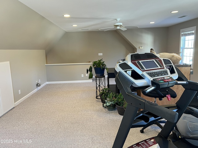 exercise area featuring ceiling fan, carpet flooring, and lofted ceiling