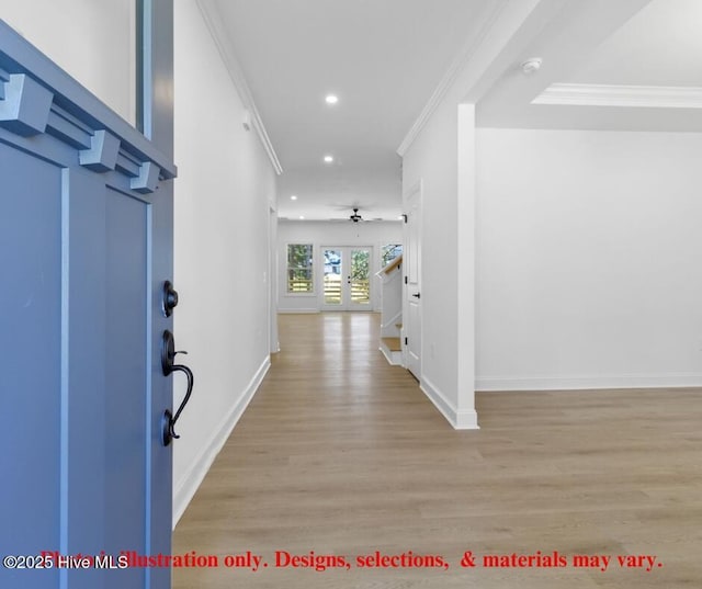 hall featuring ornamental molding, light wood-type flooring, and french doors