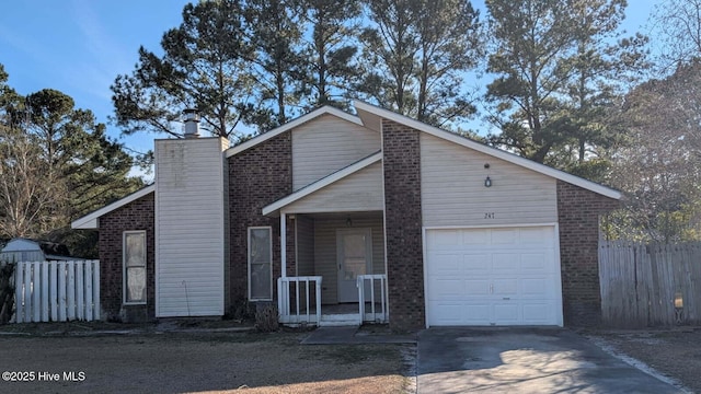 view of front of home featuring a garage and a porch